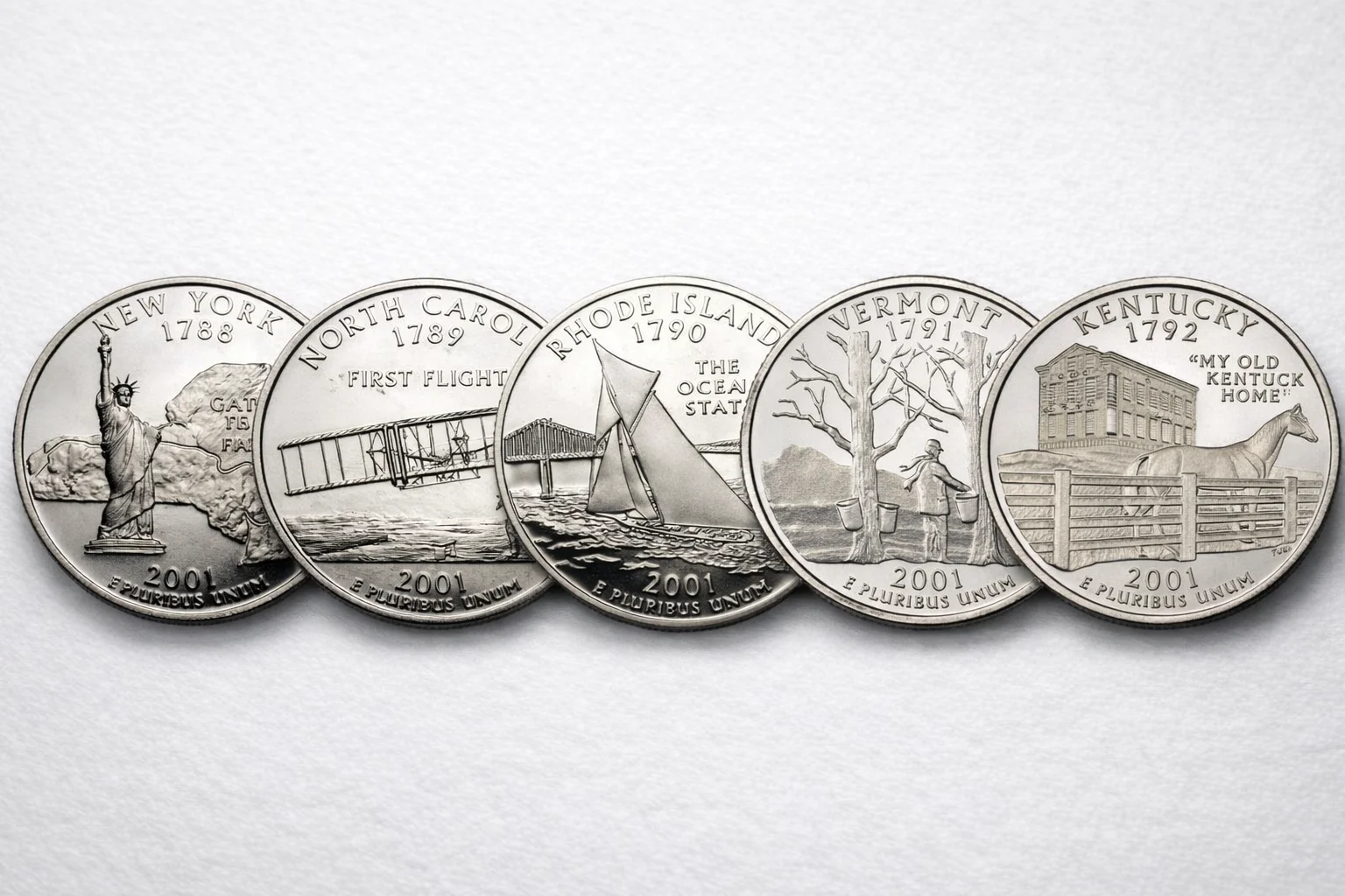 Five 2001 State Quarter reverses side-by-side.